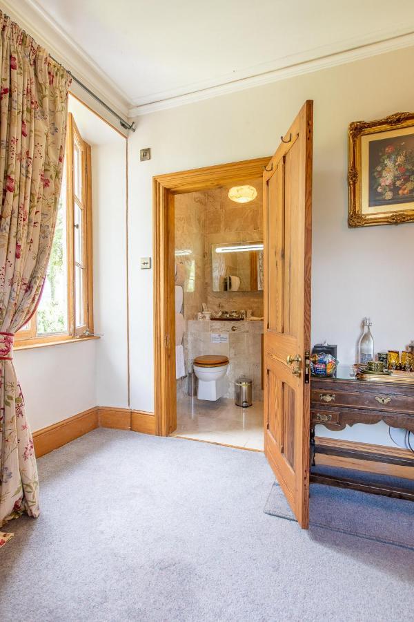 Taldraeth - Old Vicarage Guest House Penrhyndeudreath Extérieur photo